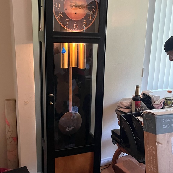 Elegant Black and Gold Grandfather Clock